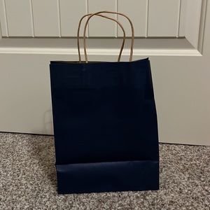 Heavy weight Navy gift bags. 100/per case. Kraft paper